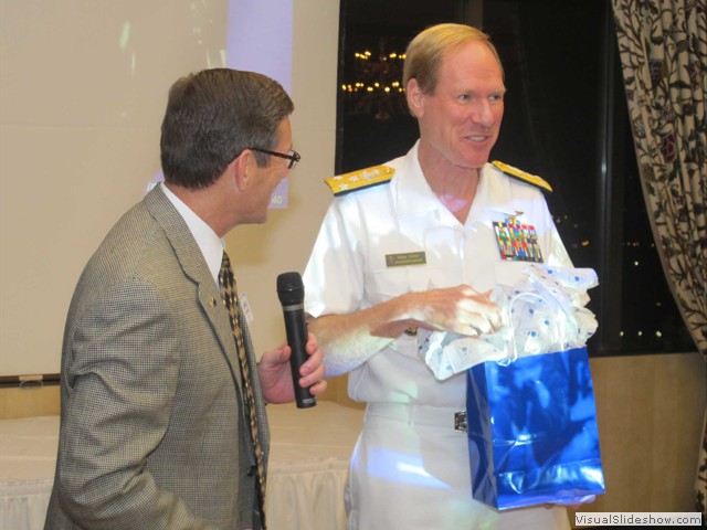Mike Kehoe presents gift to Supt Miller
